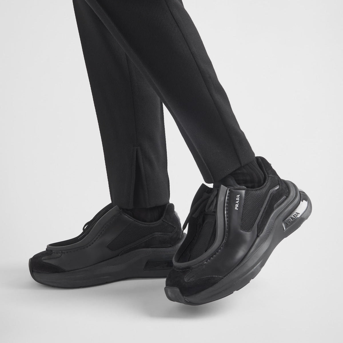 PRADA
Systeme brushed leather sneakers with bike fabric and suede elements