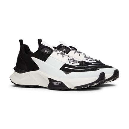 Valentino Garavani
True Act panelled sneakers.                    Runway