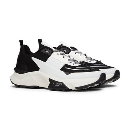 Valentino Garavani
True Act panelled sneakers.                    Runway