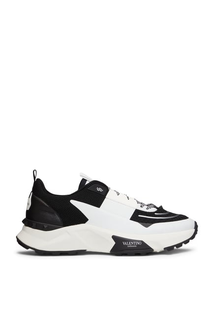 Valentino Garavani
True Act panelled sneakers.                    Runway
