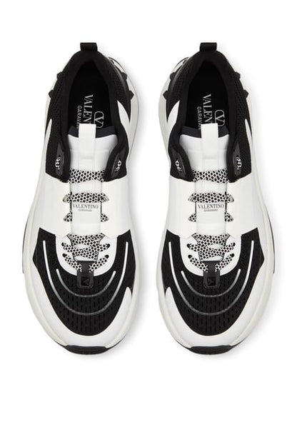 Valentino Garavani
True Act panelled sneakers.                    Runway