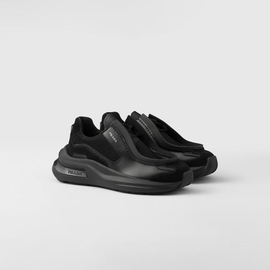 PRADA
Systeme brushed leather sneakers with bike fabric and suede elements