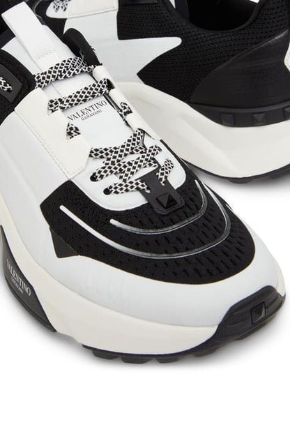 Valentino Garavani
True Act panelled sneakers.                    Runway