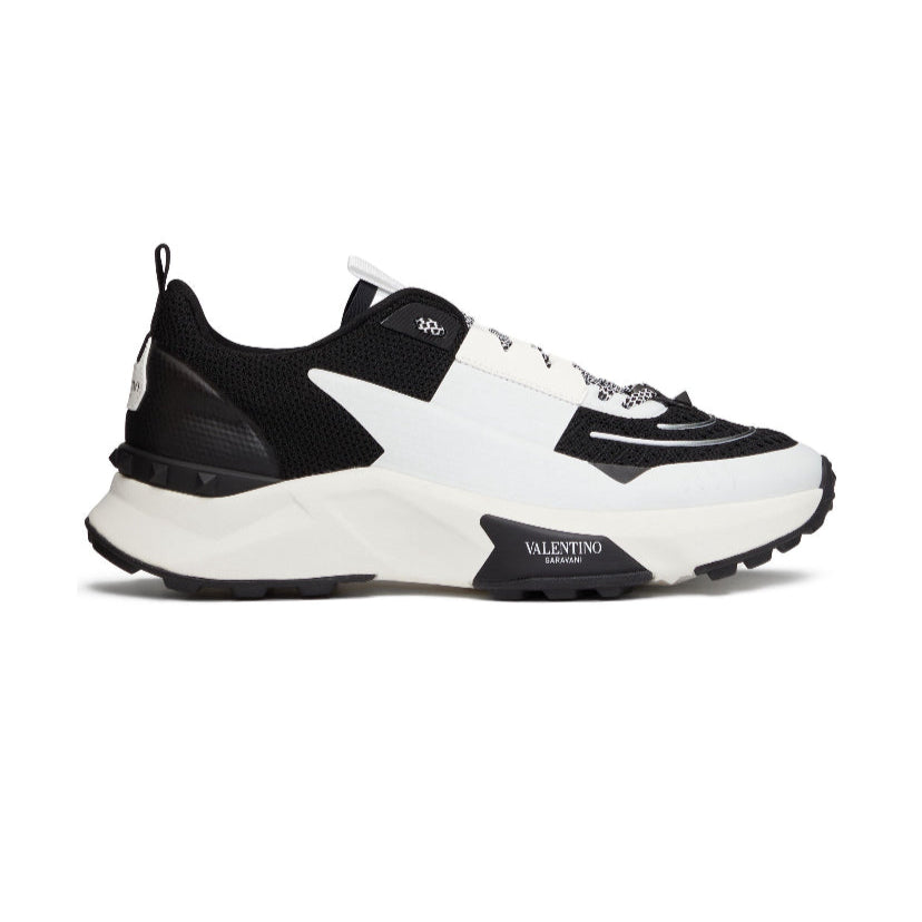 Valentino Garavani
True Act panelled sneakers.                    Runway