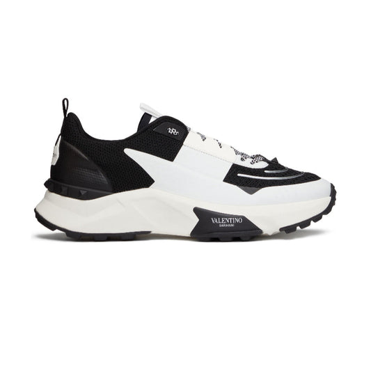 Valentino Garavani
True Act panelled sneakers.                    Runway